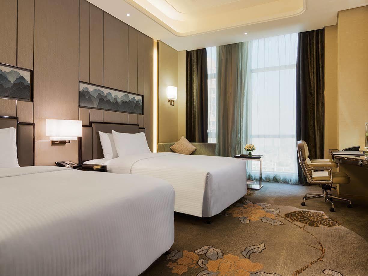 Wanda Realm Longyan Hotel Bagian luar foto